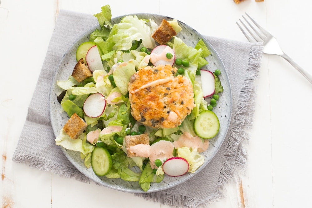Salmon Cakes over Spring Salad