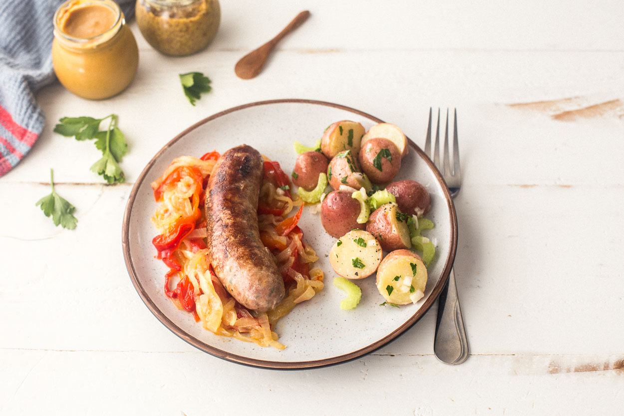 Beer Simmered Vegetarian Sausages with Peppers and Onions 