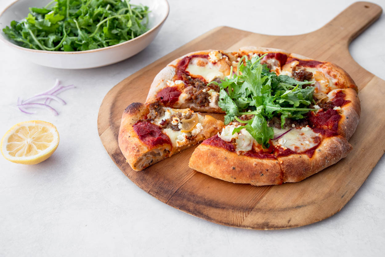 Pizza with Harissa Tomato Sauce and Sausage